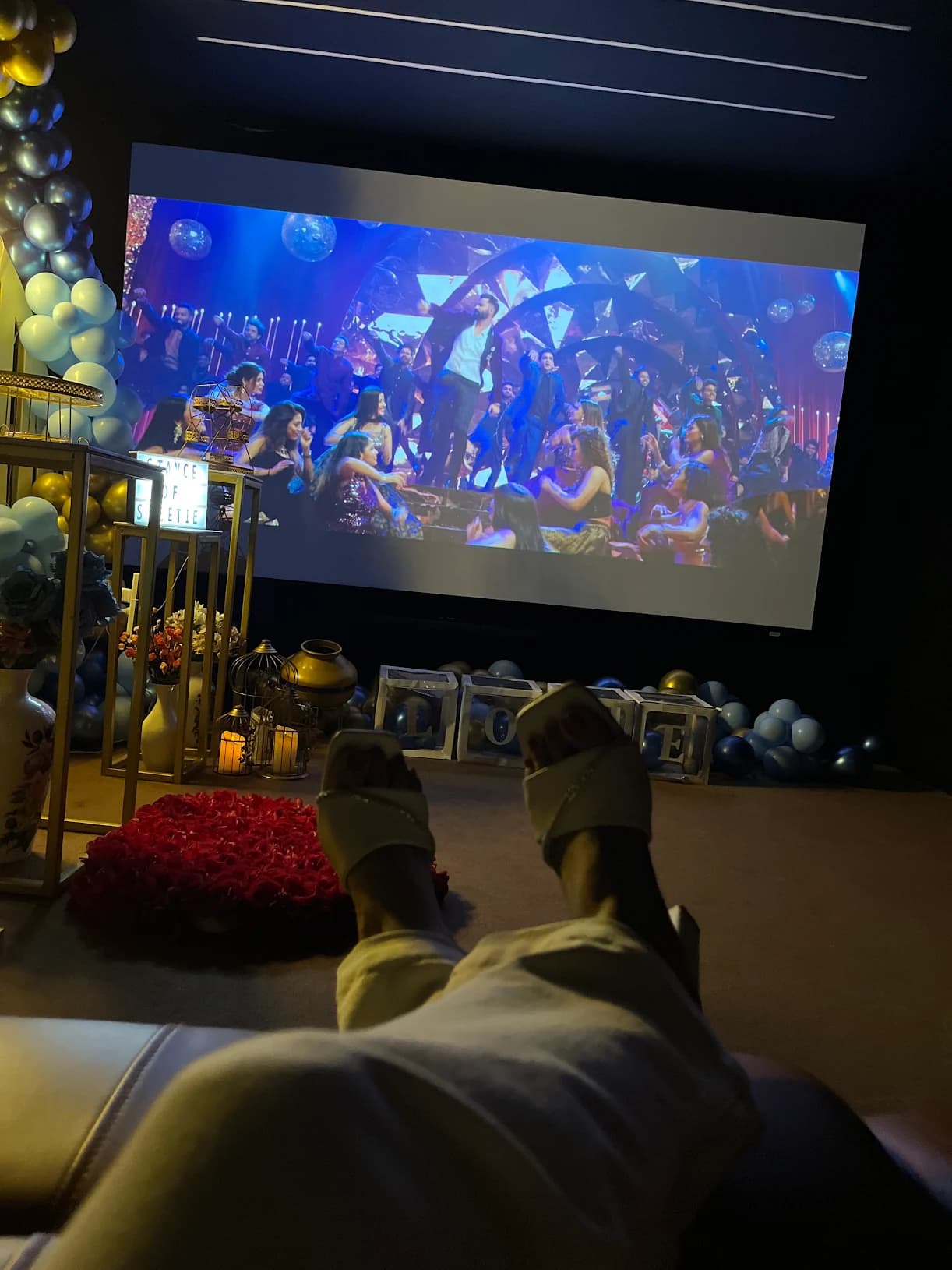 Private theatre setup with decor and projection screen